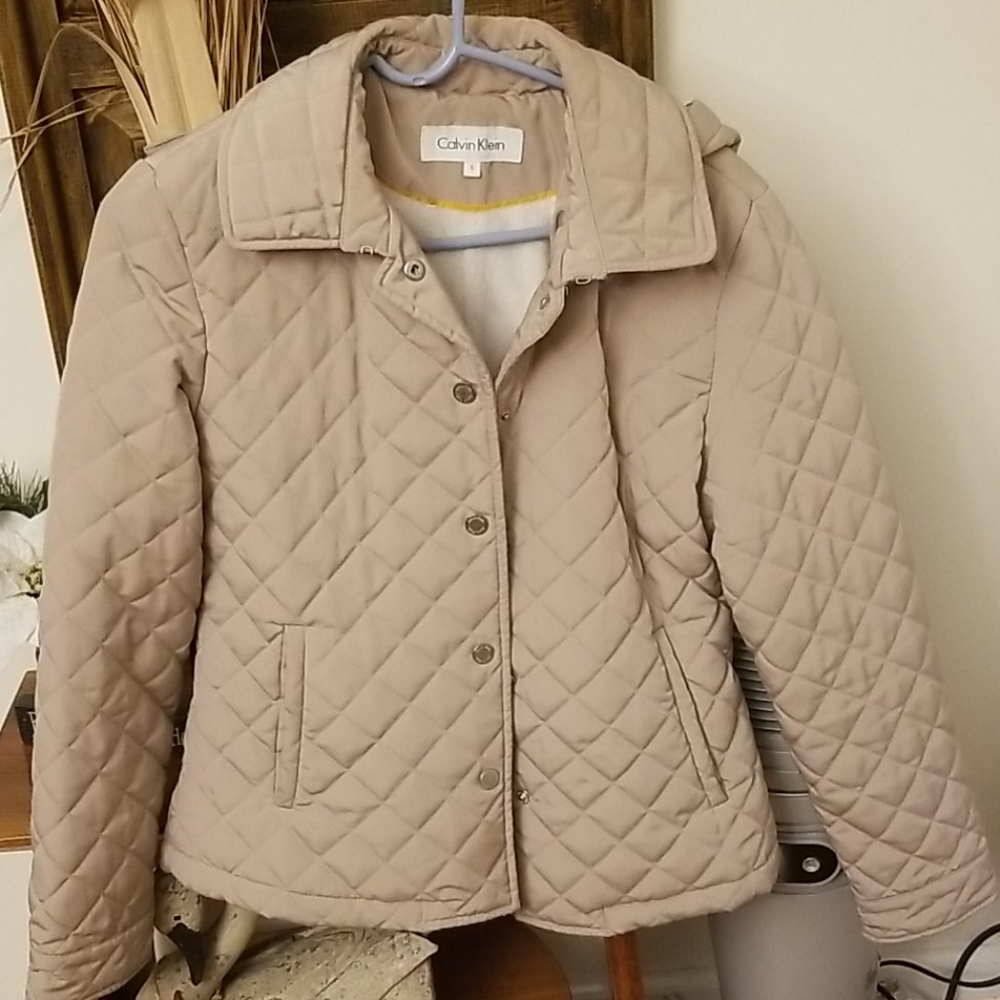 Tan quilted Calvin  Klein jacket